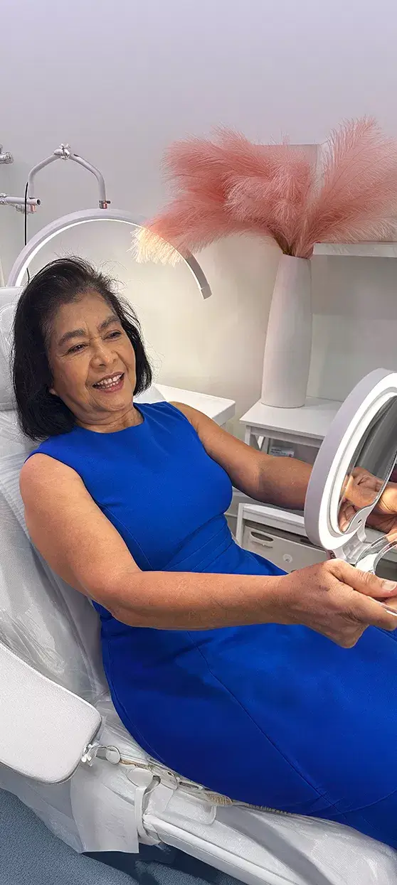 Patient smiling after professional teeth cleaning at Jupiter dental clinic