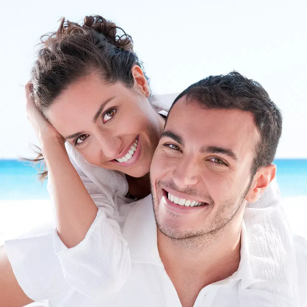  Patient smiling after professional teeth cleaning at Jupiter dental clinic