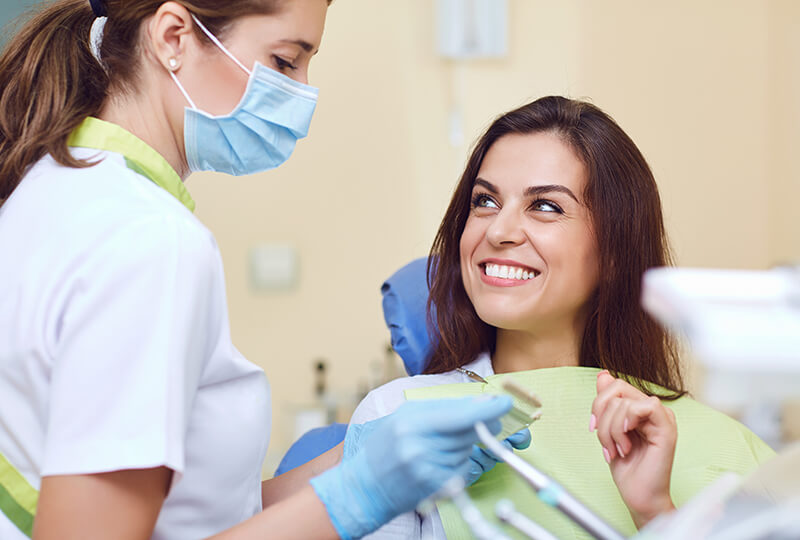 Patient smiling after dental implants procedure in Jupiter, FL
